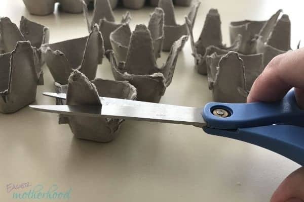 In process egg carton craft doing final cuts