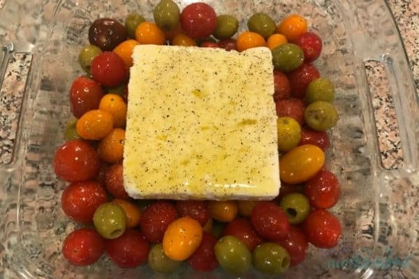 Feta, Tomatoes, and Olives ready to go in the oven after seasoning