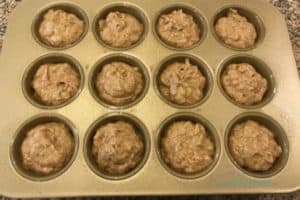 Quick and Easy Banana Bread Batter in muffin pan ready to bake