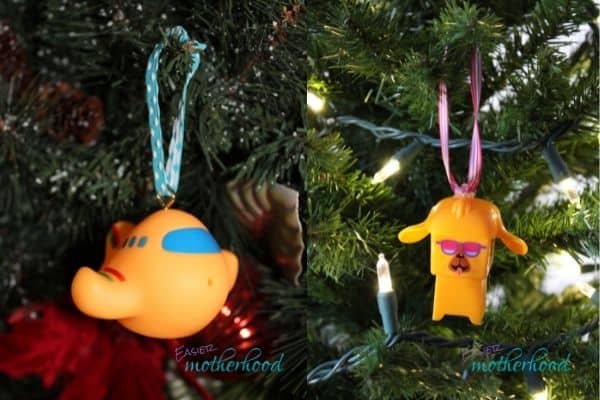 Two old toys (one plane, one block toy) turned into Christmas ornaments and hanging.