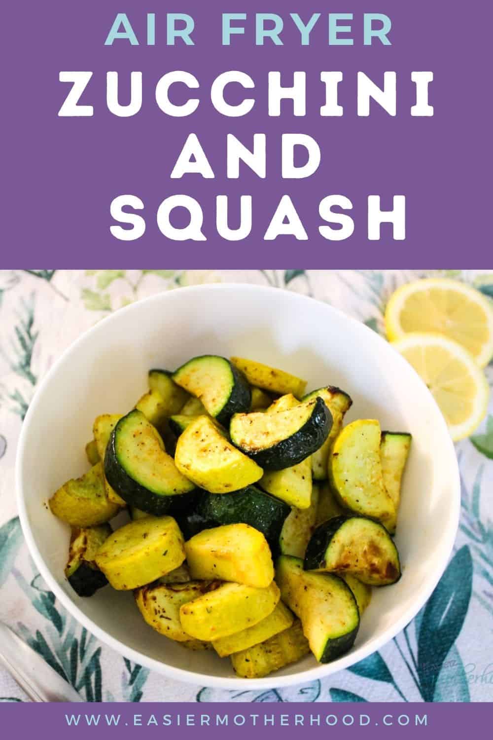 Pin with white bowl filled with air fryer squash, lemon slices and serving spoon in background.