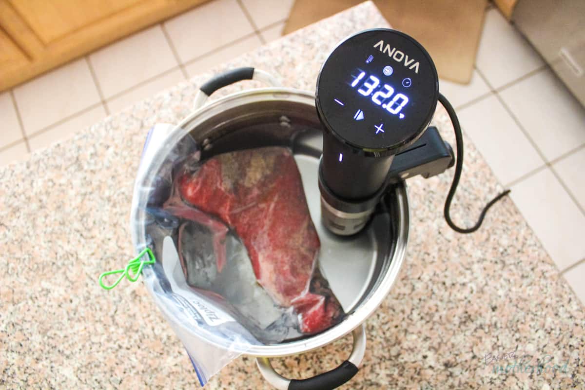 Tri tip starting to cook in sous vide at 132 degrees (displayed on cooker)