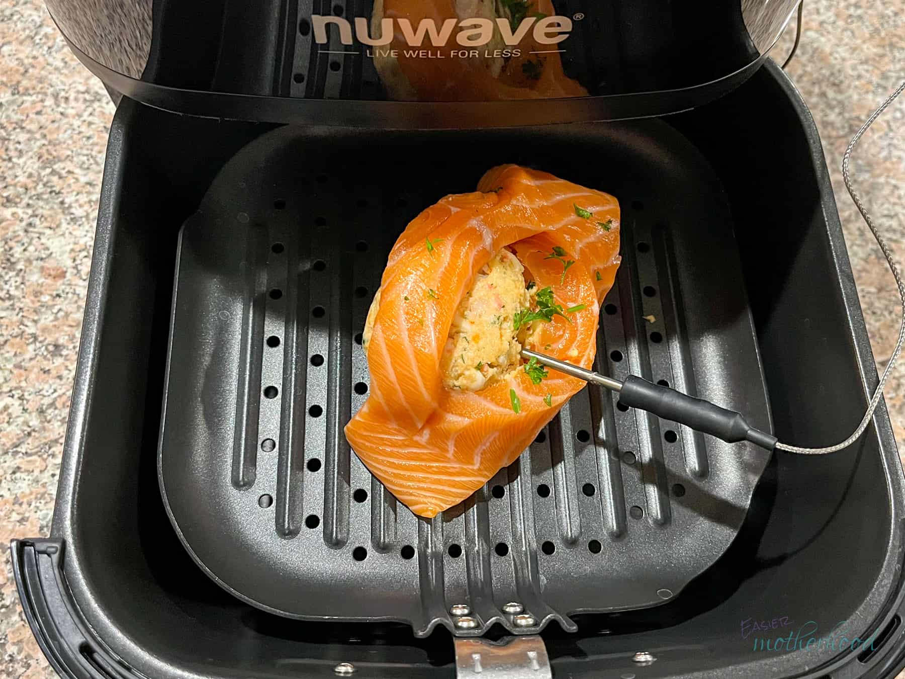 Stuffed Salmon on grill plate of air fryer