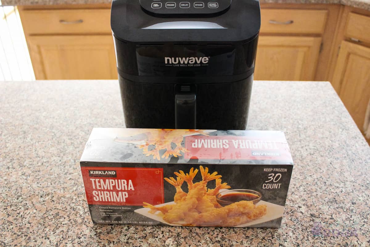 Air Fryer and frozen box of Costco tempura shrimp on a kitchen island