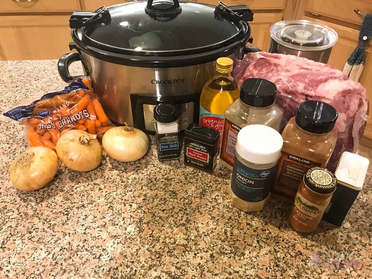 Ingredients on kitchen counter along with crock pot