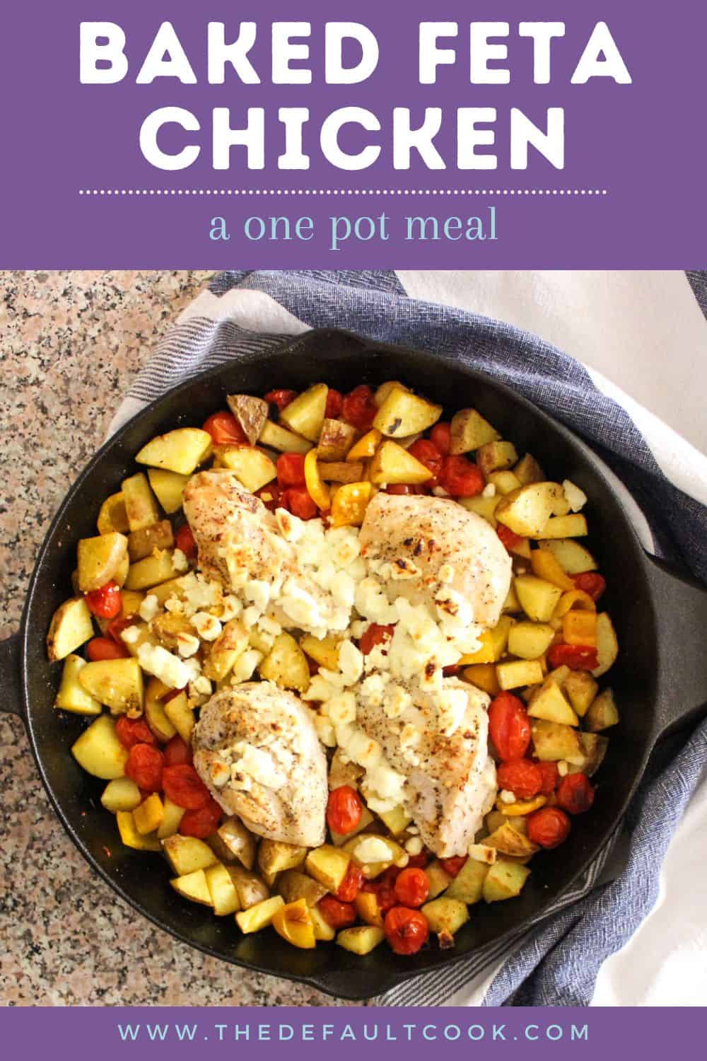 Skillet with cooked chicken breast, tomatoes, potatoes, bell peppers, and feta cheese.