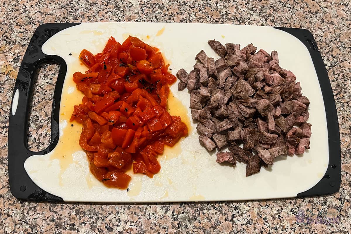 Chopped roasted red peppers and tri tip steak