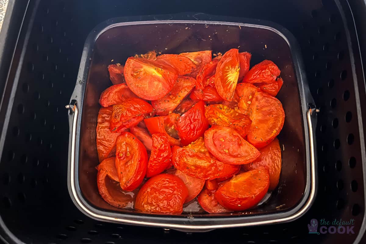 Baking dish nested inside the air fryer basket.