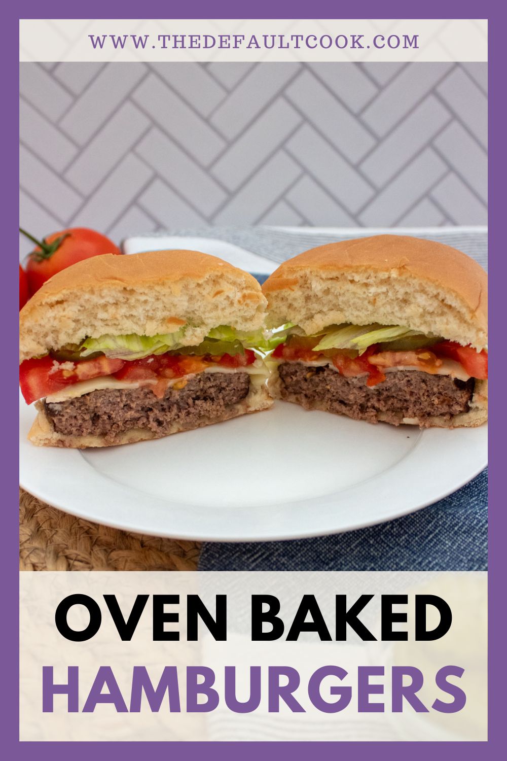 A sliced hamburger with lettuce, tomato, pickles, and cheese is on a plate. The bun is golden, and the background has a tiled wall. Text reads Oven Baked Hamburgers..